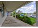Spacious covered front porch offers a charming outdoor space and neighborhood view at 1467 W 33Rd St, Indianapolis, IN 46208