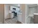 Updated kitchen with stainless steel appliances and bright white cabinets at 1467 W 33Rd St, Indianapolis, IN 46208