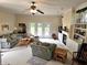 Inviting living room with plush sofas, a fireplace, and views of the outdoor space, perfect for relaxation at 1506 Field Dr, Noblesville, IN 46060