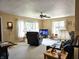 Bright and airy living room featuring neutral carpet and comfortable furniture at 1506 Field Dr, Noblesville, IN 46060