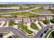 Aerial view of a residential neighborhood with a pond at 15332 Atkinson Dr, Noblesville, IN 46060