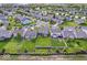Desirable neighborhood featuring manicured lawns, mature trees, and a tranquil pond view at 15332 Atkinson Dr, Noblesville, IN 46060