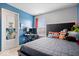 This cozy bedroom features a bed, desk, and window for natural light at 15332 Atkinson Dr, Noblesville, IN 46060