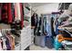 Organized walk-in closet with shelves, hanging rods, and storage bins for optimal storage at 15332 Atkinson Dr, Noblesville, IN 46060