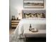 Relaxing bedroom showcasing a tufted headboard, a decorative bench and a modern color palette at 15882 Vitalize Run, Fishers, IN 46040