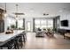 Spacious open floor plan with a modern decor, stylish furnishings and an eat in kitchen area at 15882 Vitalize Run, Fishers, IN 46040