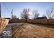 Large backyard with a wooden fence, offering lots of space for recreation and enjoyment at 1641 Iowa St, Indianapolis, IN 46203