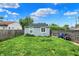 Spacious backyard featuring lush green grass, a privacy fence, and ample space for outdoor activities and relaxation at 1641 Iowa St, Indianapolis, IN 46203