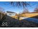 Spacious backyard surrounded by a wood fence, offering plenty of room for outdoor activities at 1641 Iowa St, Indianapolis, IN 46203