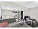 Finished basement with neutral paint, durable floors, and casual seating, ideal for additional living space or entertainment at 1641 Iowa St, Indianapolis, IN 46203