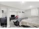 Finished basement featuring resilient flooring and casual seating, creating an inviting space for relaxation or entertainment at 1641 Iowa St, Indianapolis, IN 46203