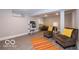 Well-lit basement offers versatile space and features modern flooring, neutral walls, and stylish accents at 1641 Iowa St, Indianapolis, IN 46203