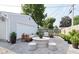 Inviting backyard patio with stylish seating, decorative plants, and a cozy ambiance at 1855 Cruft St, Indianapolis, IN 46203
