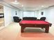 Finished basement with a pool table and home theater setup for recreation and entertainment at 18680 Long Walk Ln, Noblesville, IN 46060