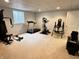 Basement gym with treadmill, elliptical, and other fitness equipment for convenient workouts at 18680 Long Walk Ln, Noblesville, IN 46060