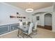 Stylish dining room with modern lighting, elegant decor, and comfortable seating for Gathering meals at 18680 Long Walk Ln, Noblesville, IN 46060