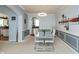 Stylish dining room with modern lighting, elegant decor, and comfortable seating for Gathering meals at 18680 Long Walk Ln, Noblesville, IN 46060