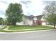 A lovely two-story home from street view, showcasing its well-maintained lawn and charming architecture at 18680 Long Walk Ln, Noblesville, IN 46060
