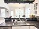 Bright kitchen featuring stainless steel appliances, undermount sink and tiled backsplash at 18680 Long Walk Ln, Noblesville, IN 46060