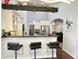 Kitchen with a breakfast bar, white cabinets, stainless steel appliances, and ample counter space at 18680 Long Walk Ln, Noblesville, IN 46060