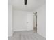 Bright bedroom features neutral carpet and a door leading to another room at 1906 N Park Ave, Indianapolis, IN 46202
