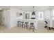 Contemporary kitchen featuring stainless steel appliances, pendant lighting, and seating at the island at 1906 N Park Ave, Indianapolis, IN 46202