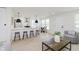 Stylish kitchen featuring a breakfast bar, stainless steel appliances, and ample counter space at 1906 N Park Ave, Indianapolis, IN 46202