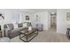 Cozy living room with neutral decor, a comfortable sofa, and an inviting atmosphere at 1906 N Park Ave, Indianapolis, IN 46202