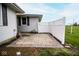 Back patio featuring a paver patio surrounded by a white lattice fence at 1970 E 1100 N, Alexandria, IN 46001