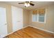 Comfortable bedroom with ceiling fan, closet and window with blinds at 1970 E 1100 N, Alexandria, IN 46001
