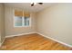 Bedroom with natural light, hardwood floors, and neutral paint at 1970 E 1100 N, Alexandria, IN 46001