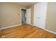 Bedroom with wood floors, double closet and neutral paint at 1970 E 1100 N, Alexandria, IN 46001