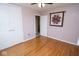 This bedroom has wood floors, a quilt, and a closet at 1970 E 1100 N, Alexandria, IN 46001