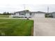 Charming single-story home with a long driveway and detached garage at 1970 E 1100 N, Alexandria, IN 46001