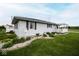 Charming single-story home with landscape and an angel statue at 1970 E 1100 N, Alexandria, IN 46001