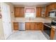 Well-maintained kitchen featuring oak cabinets, stainless steel appliances, and neutral countertops at 1970 E 1100 N, Alexandria, IN 46001