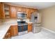 Modern kitchen with stainless steel appliances, oak cabinets, and contemporary countertops at 1970 E 1100 N, Alexandria, IN 46001