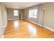 Bright living room featuring hardwood floors, neutral walls, and plenty of natural light at 1970 E 1100 N, Alexandria, IN 46001