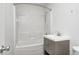 Bathroom features shower-tub combo and vanity at 2021 Reformers Ave, Indianapolis, IN 46203