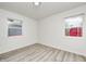 Bedroom featuring updated flooring and a window for natural light at 2021 Reformers Ave, Indianapolis, IN 46203
