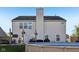 Large backyard with well-maintained above-ground pool, deck area, and lush green lawn at 2116 Crimson Ln, Lebanon, IN 46052