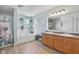 Bright bathroom featuring a double vanity, large tub, and modern decor at 2116 Crimson Ln, Lebanon, IN 46052