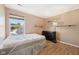 Simple bedroom featuring wood floors, and a black dresser at 2116 Crimson Ln, Lebanon, IN 46052