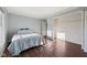 Bright bedroom with walk-in closet, wood floors, and natural light at 2116 Crimson Ln, Lebanon, IN 46052