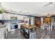 Kitchen featuring stainless steel appliances, white cabinets, and a central island with butcher block top at 2116 Crimson Ln, Lebanon, IN 46052