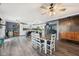 Spacious kitchen with white cabinets, wood-look floors, and a dining table at 2116 Crimson Ln, Lebanon, IN 46052