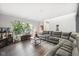 Bright living room featuring a comfortable sectional sofa, with plenty of natural light and stylish decor at 2116 Crimson Ln, Lebanon, IN 46052