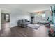 Loft area featuring modern sectional sofa, exercise equipment and hardwood floors at 2116 Crimson Ln, Lebanon, IN 46052