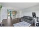 Upstairs loft featuring modern sofa, exercise equipment and railing at 2116 Crimson Ln, Lebanon, IN 46052