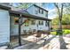 Inviting backyard deck with outdoor seating and covered pergola providing a cozy space for relaxing and entertaining at 2221 Douglas Rd, Indianapolis, IN 46220